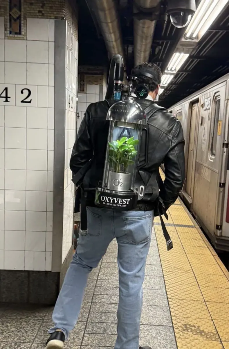 OxyVest — worn on the NYC subway platform, back view